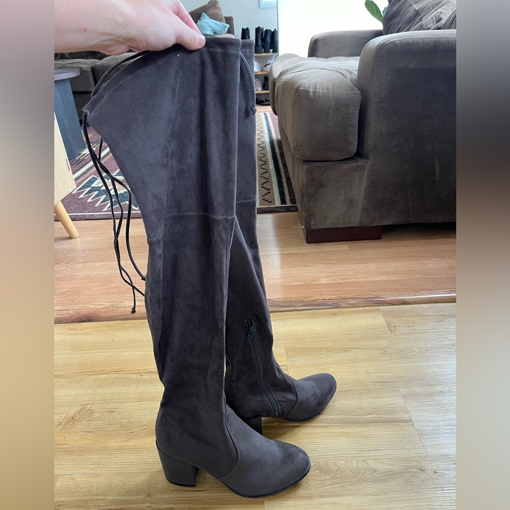 Dark grey faux suade knee high boots. Heel size 2.5”. Size 8M. Barely worn.